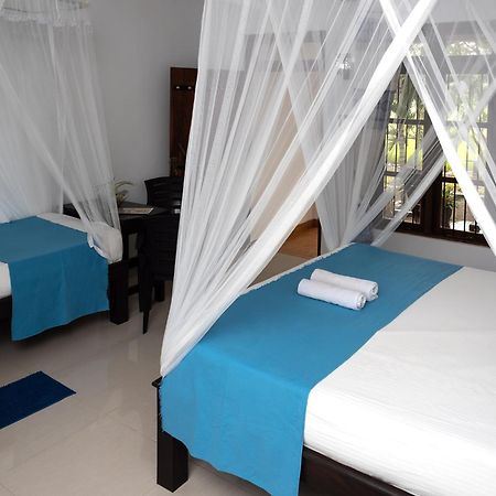 Lake Wind Habarana Bagian luar foto